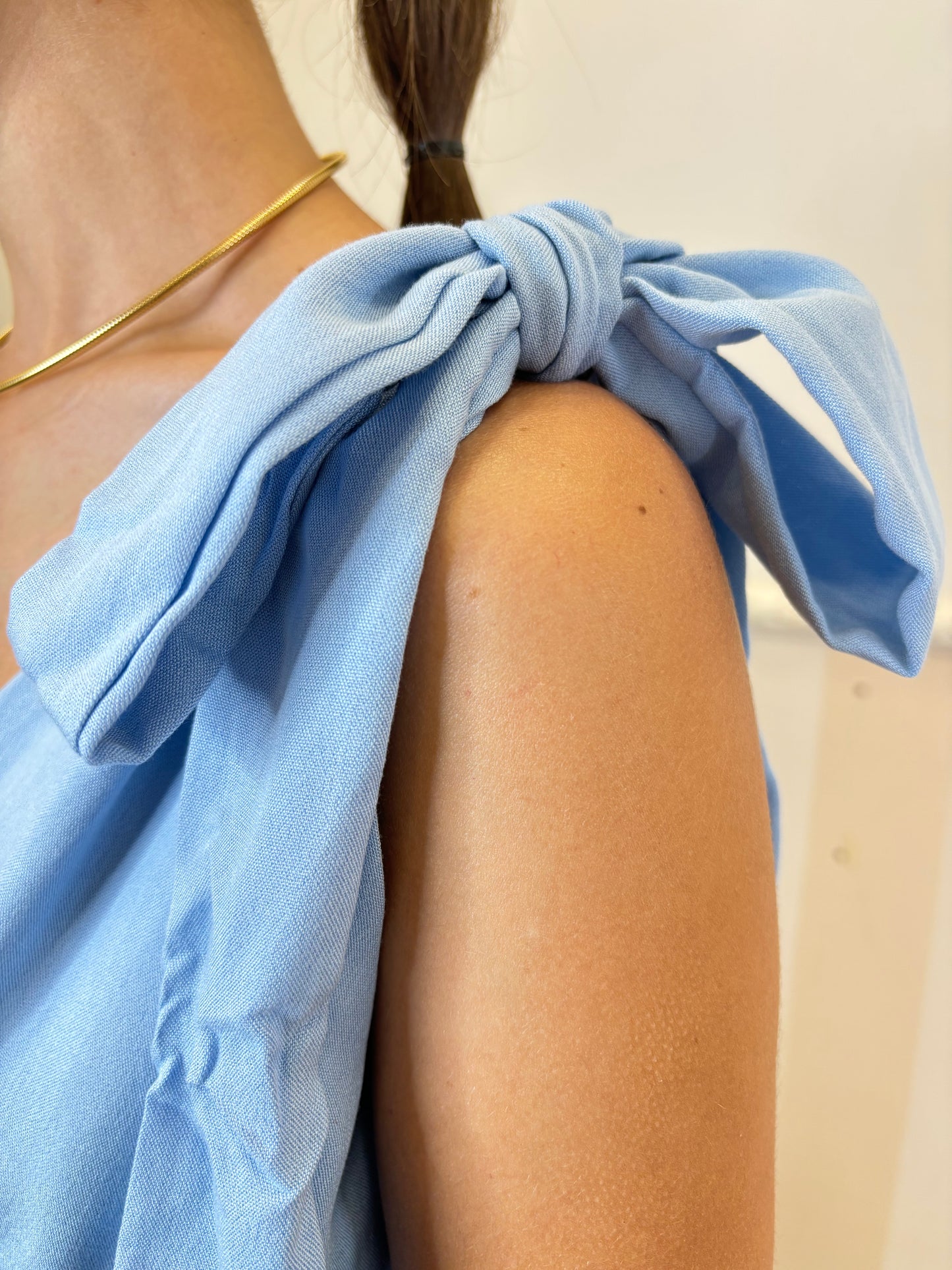 Abito fiocco azzurro